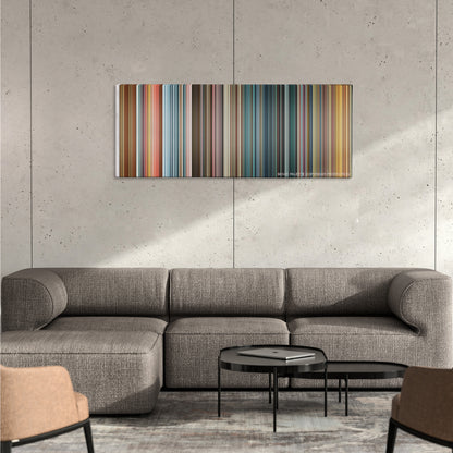 Hard Candy color palette canvas on a concrete wall above a gray sectional sofa
