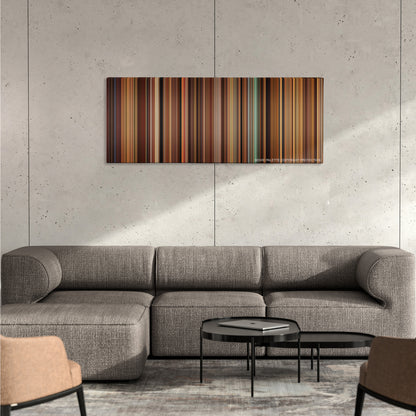 Once Upon a Time in Mexico color palette canvas on a concrete wall above a gray sectional sofa