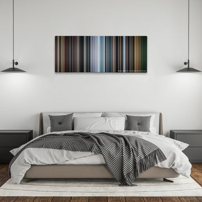 REC color palette canvas above a bed, between two black pendant lamps