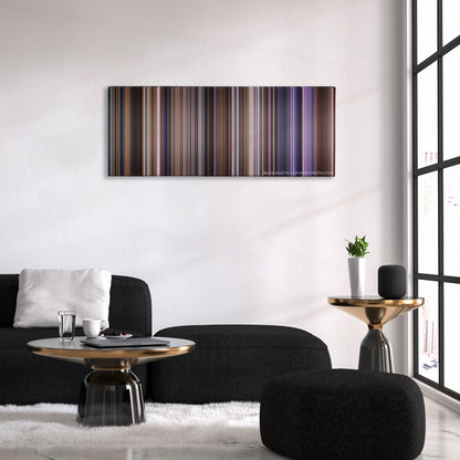 Contact color palette canvas above a black sofa with a gold-topped table