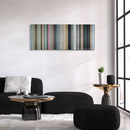 3 Idiots color palette canvas above a black sofa with a gold-topped table