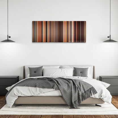 Jack and Jill color palette canvas above a bed, between two black pendant lamps