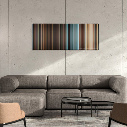 The Mummy: Tomb of the Dragon Emperor color palette canvas on a concrete wall above a gray sectional sofa