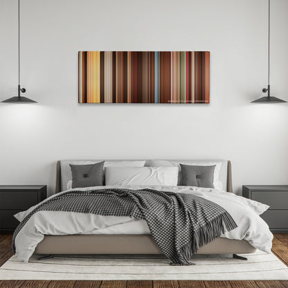 Alexander color palette canvas above a bed, between two black pendant lamps
