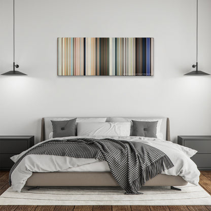 Baywatch color palette canvas above a bed, between two black pendant lamps