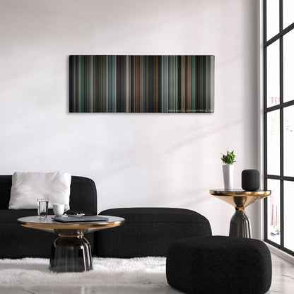 The Machinist color palette canvas above a black sofa with a gold-topped table