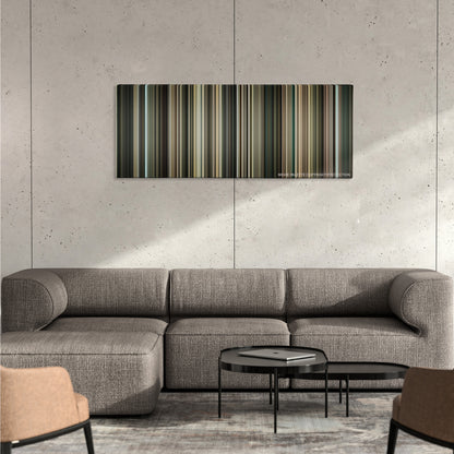 Incendies color palette canvas on a concrete wall above a gray sectional sofa