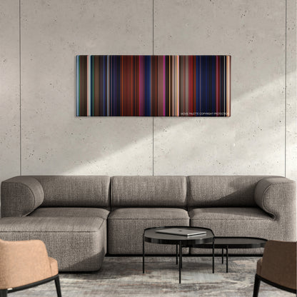 House of 1000 Corpses color palette canvas on a concrete wall above a gray sectional sofa