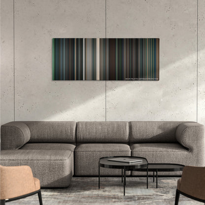 Flightplan color palette canvas on a concrete wall above a gray sectional sofa