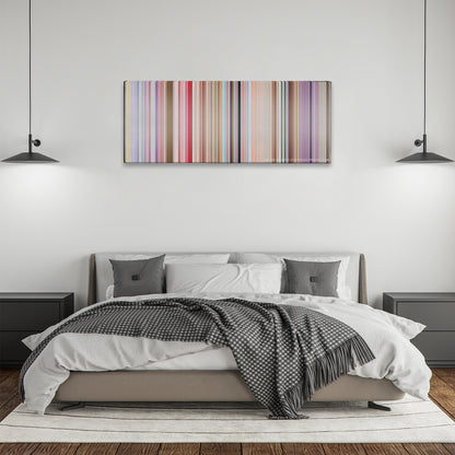 PK color palette canvas above a bed, between two black pendant lamps