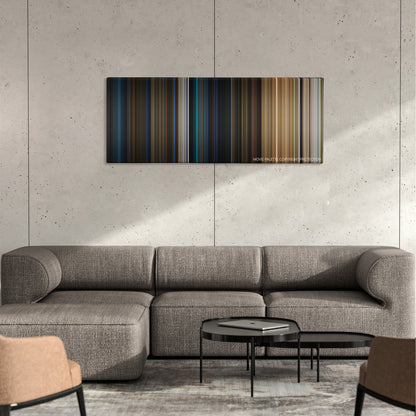 The BFG color palette canvas on a concrete wall above a gray sectional sofa