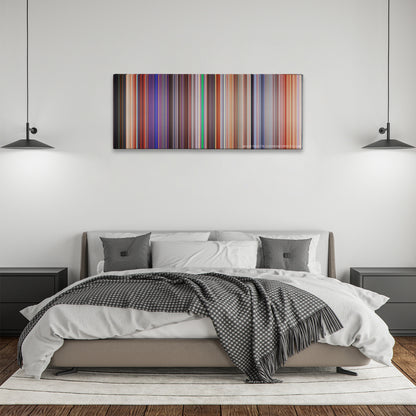 Cars 2 color palette canvas above a bed, between two black pendant lamps