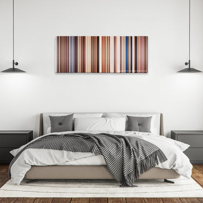 Holes color palette canvas above a bed, between two black pendant lamps