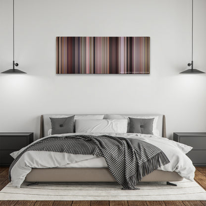 Road Trip color palette canvas above a bed, between two black pendant lamps