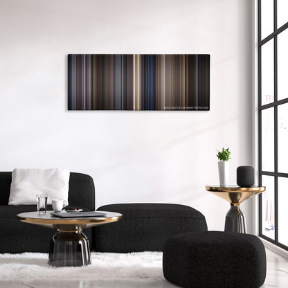 Along Came a Spider color palette canvas above a black sofa with a gold-topped table