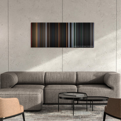 U-571 color palette canvas on a concrete wall above a gray sectional sofa