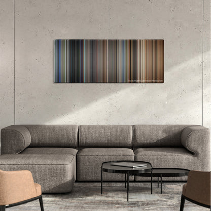 Assassins color palette canvas on a concrete wall above a gray sectional sofa