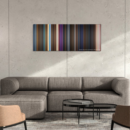 Mary Poppins Returns color palette canvas on a concrete wall above a gray sectional sofa