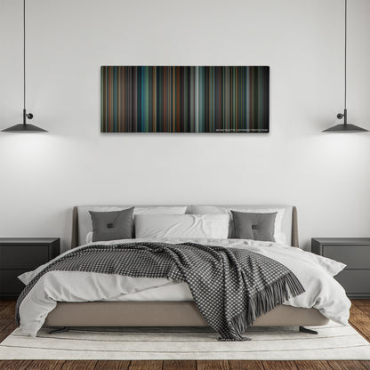 The Insider color palette canvas above a bed, between two black pendant lamps