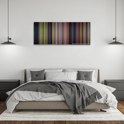 Over the Hedge color palette canvas above a bed, between two black pendant lamps