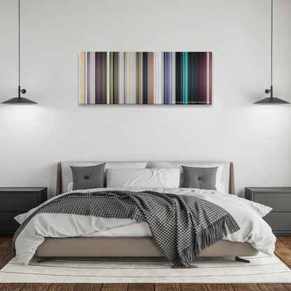 Central Intelligence color palette canvas above a bed, between two black pendant lamps