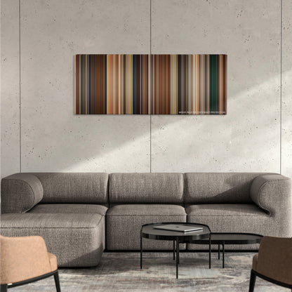 Next color palette canvas on a concrete wall above a gray sectional sofa