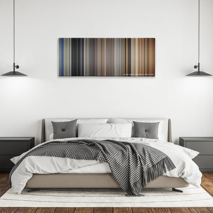 Assassins color palette canvas above a bed, between two black pendant lamps