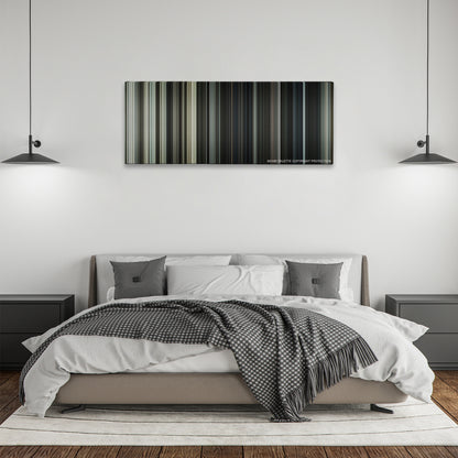 Letters from Iwo Jima color palette canvas above a bed, between two black pendant lamps