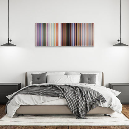 Cars 3 color palette canvas above a bed, between two black pendant lamps