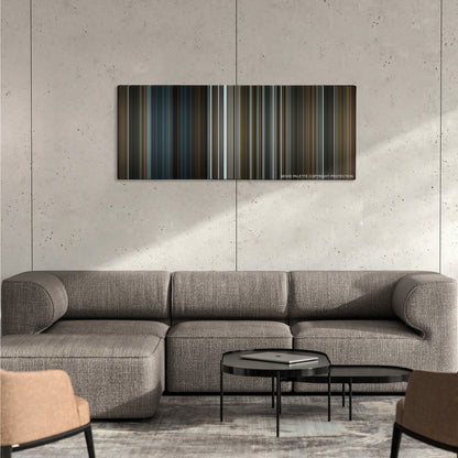 The Invisible Guest color palette canvas on a concrete wall above a gray sectional sofa