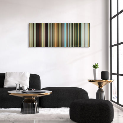 Mechanic: Resurrection color palette canvas above a black sofa with a gold-topped table