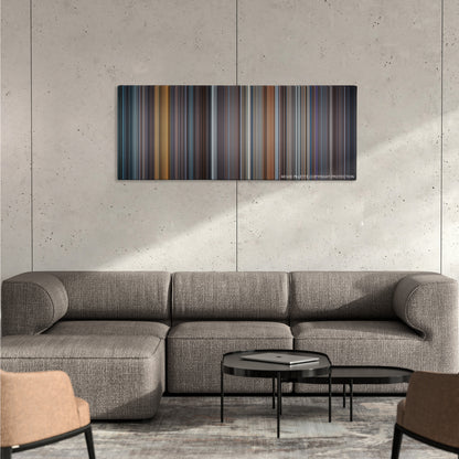 Spy Game color palette canvas on a concrete wall above a gray sectional sofa