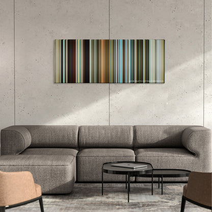 Mechanic: Resurrection color palette canvas on a concrete wall above a gray sectional sofa