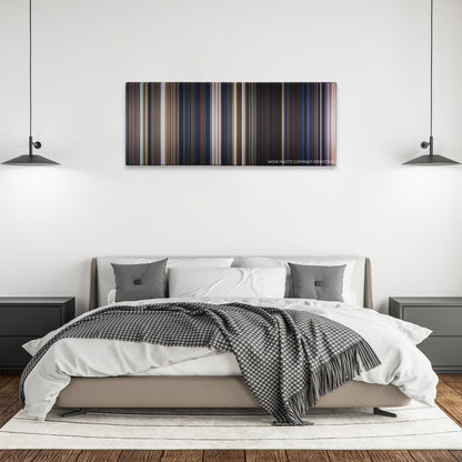 Frailty color palette canvas above a bed, between two black pendant lamps