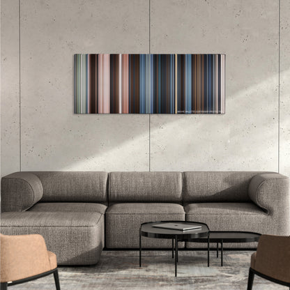 47 Ronin color palette canvas on a concrete wall above a gray sectional sofa
