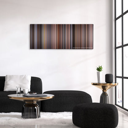 Fatal Attraction color palette canvas above a black sofa with a gold-topped table