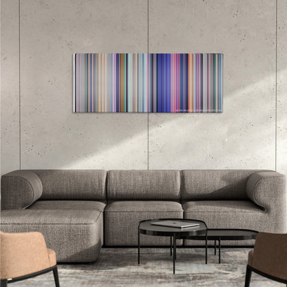 Cinderella color palette canvas on a concrete wall above a gray sectional sofa