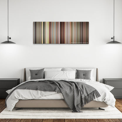 Detachment color palette canvas above a bed, between two black pendant lamps