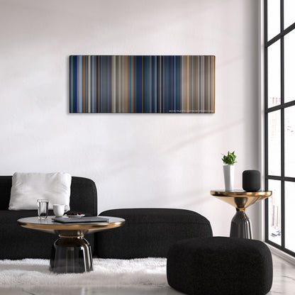 The Rock color palette canvas above a black sofa with a gold-topped table