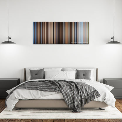 Hidalgo color palette canvas above a bed, between two black pendant lamps