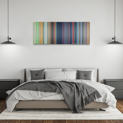 One Hundred and One Dalmatians color palette canvas above a bed, between two black pendant lamps