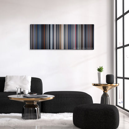 I Am Mother color palette canvas above a black sofa with a gold-topped table