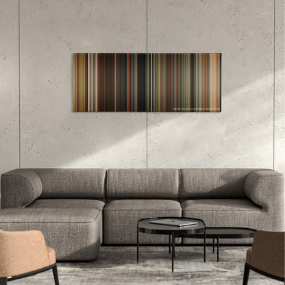 Abduction color palette canvas on a concrete wall above a gray sectional sofa