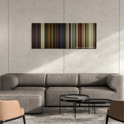 Star Trek: Generations color palette canvas on a concrete wall above a gray sectional sofa