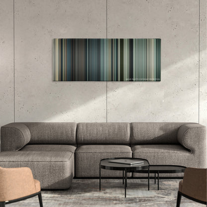 I Spit on Your Grave color palette canvas on a concrete wall above a gray sectional sofa