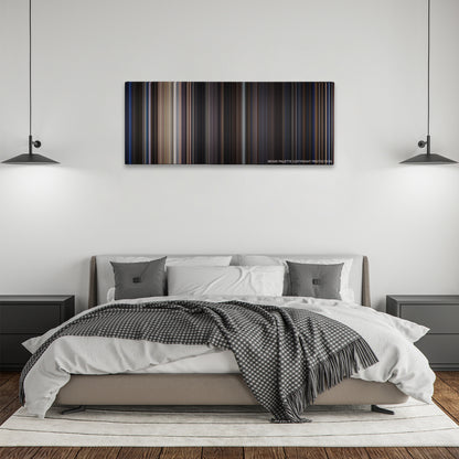 The Punisher color palette canvas above a bed, between two black pendant lamps