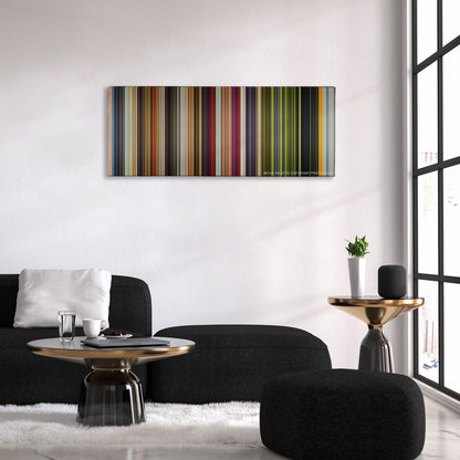 Monsters University color palette canvas above a black sofa with a gold-topped table