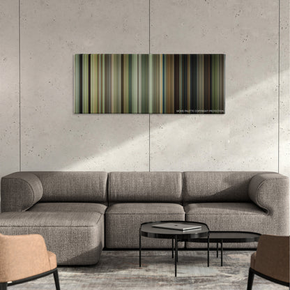 The Highwaymen color palette canvas on a concrete wall above a gray sectional sofa