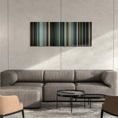 Mr. Brooks color palette canvas on a concrete wall above a gray sectional sofa