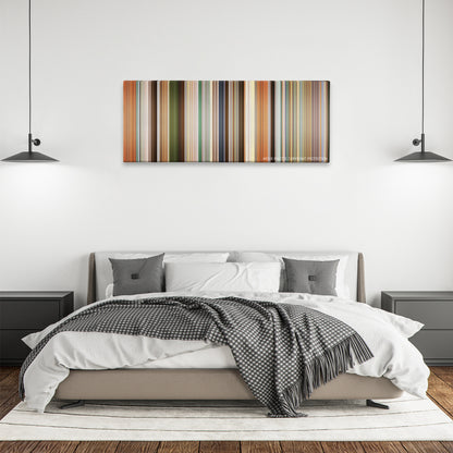 Going in Style color palette canvas above a bed, between two black pendant lamps